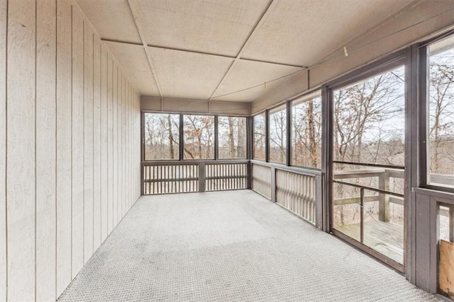 unfurnished sunroom with a wealth of natural light