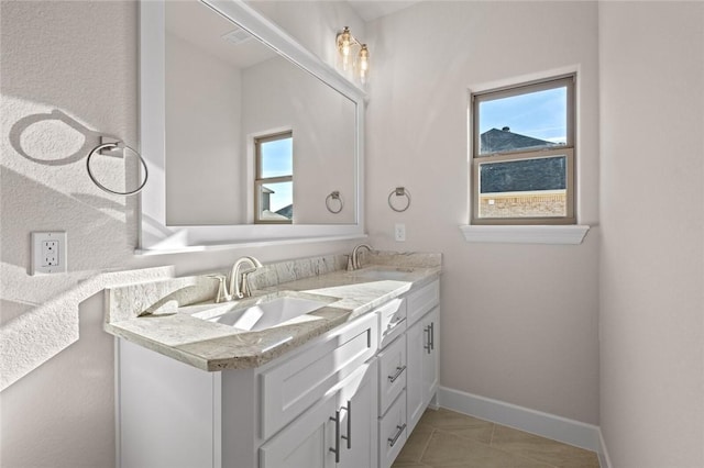 bathroom featuring vanity and tile patterned flooring