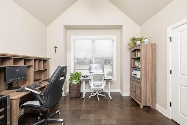 home office featuring dark wood-type flooring and vaulted ceiling