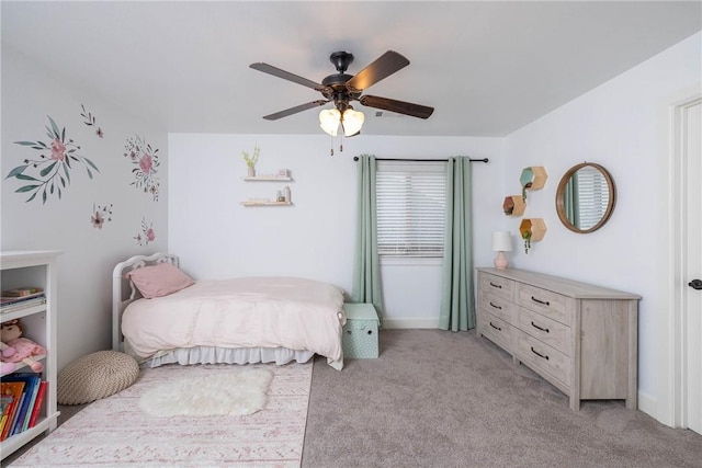 bedroom featuring light carpet and ceiling fan