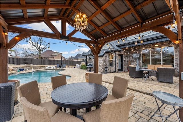 view of patio with a gazebo and a fenced in pool