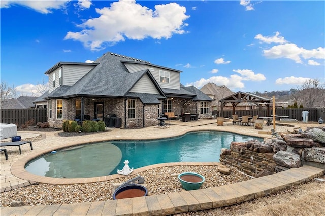 view of pool with a gazebo and a patio