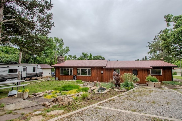 19724 Waldon Rd, Rogers, AR 72756 - ranch-style home featuring a chimney and metal roof