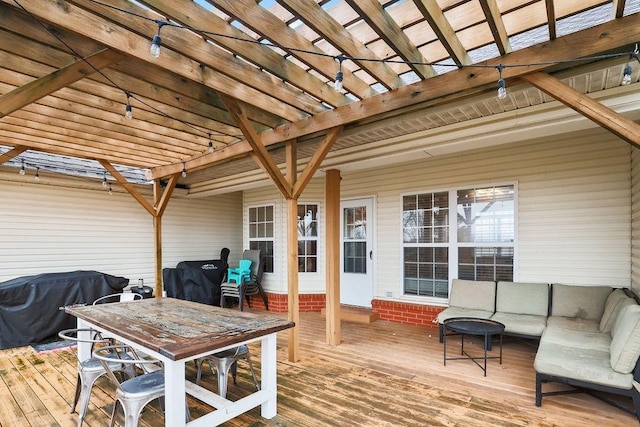 wooden deck with a pergola, outdoor dining area, and outdoor lounge area