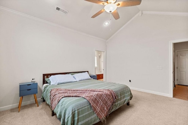 carpeted bedroom featuring vaulted ceiling, baseboards, crown molding, and a ceiling fan