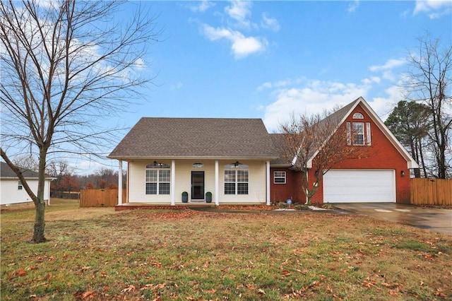 view of front of home with a porch, driveway, brick siding, a garage, and roof with shingles