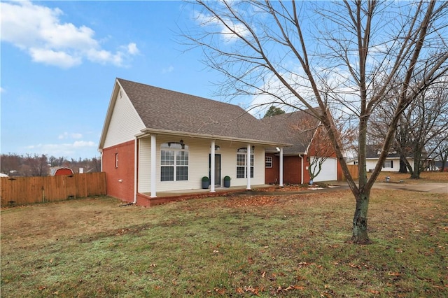 view of front facade with a porch, brick siding, roof with shingles, concrete driveway, and a garage