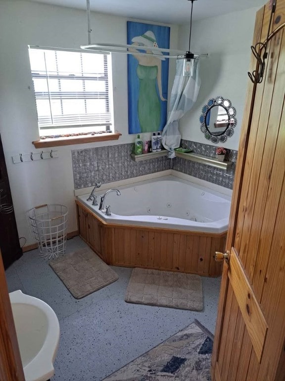 bathroom featuring a tub