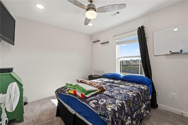 carpeted bedroom with ceiling fan