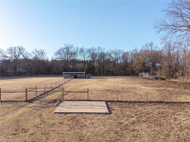 view of yard with a rural view