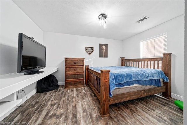 bedroom featuring wood-type flooring