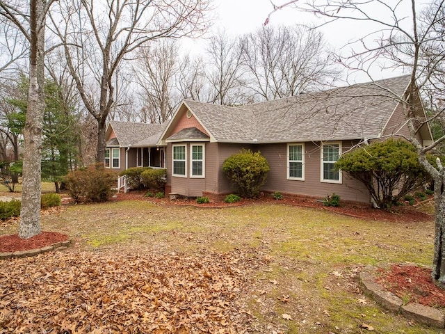 ranch-style home with a front yard