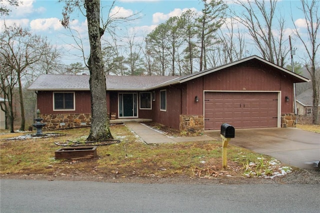 ranch-style home with a garage