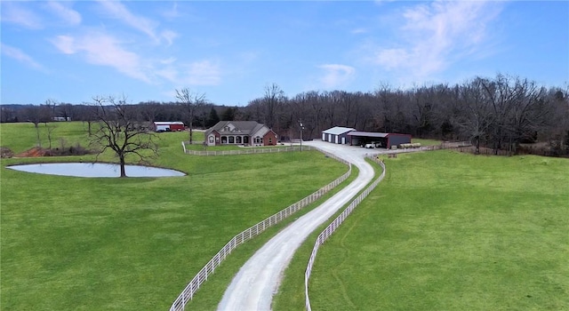 view of community with a yard