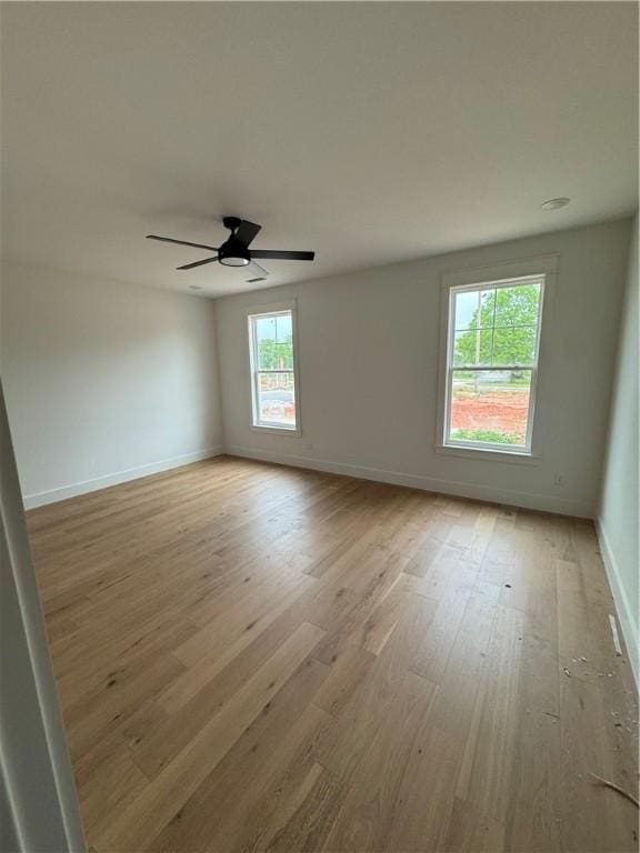 4750 Cowboy St, Springdale, AR 72762 - unfurnished room featuring light wood-style floors, baseboards, and ceiling fan