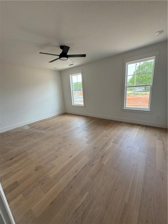 4750 Cowboy St, Springdale, AR 72762 - unfurnished room with light wood finished floors, baseboards, and ceiling fan