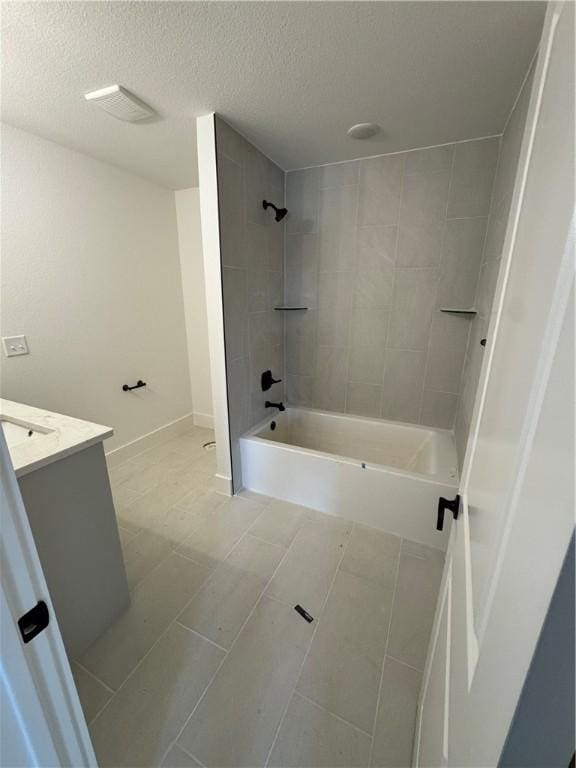 4750 Cowboy St, Springdale, AR 72762 - full bath featuring vanity, shower / tub combination, a textured ceiling, and baseboards