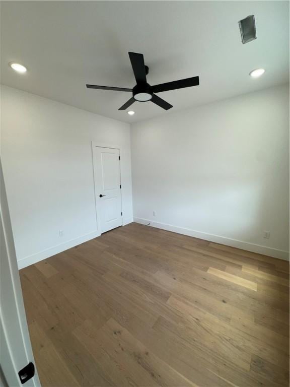 4750 Cowboy St, Springdale, AR 72762 - unfurnished room with a ceiling fan, wood finished floors, baseboards, and recessed lighting