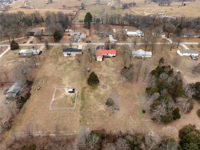 birds eye view of property featuring a rural view