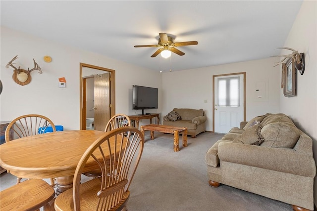 dining room with carpet floors and ceiling fan