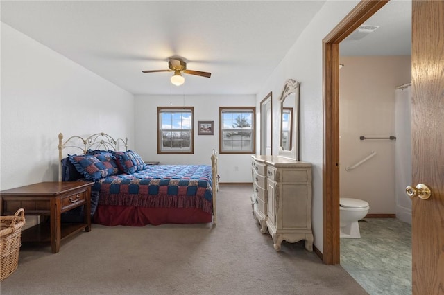 bedroom featuring carpet, connected bathroom, and ceiling fan