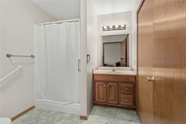 bathroom with vanity and a shower with shower curtain