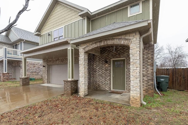 doorway to property featuring a garage