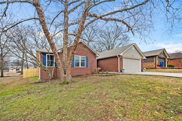 ranch-style house with a garage and a front yard