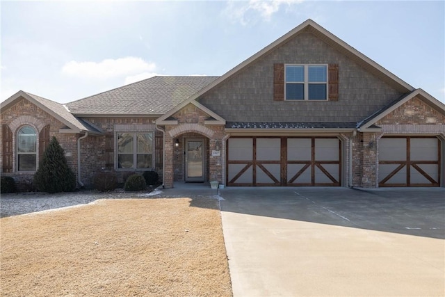 view of front of property featuring a garage