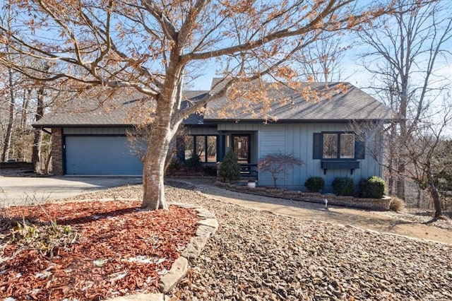 ranch-style home featuring a garage