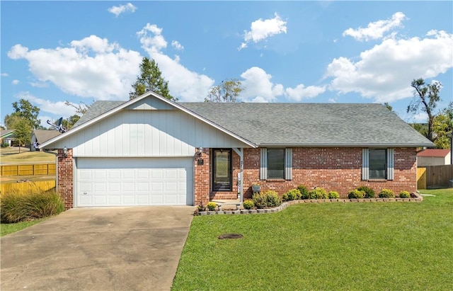 ranch-style home with a garage and a front yard