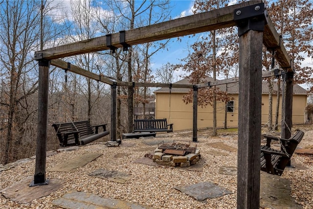 view of yard featuring a fire pit