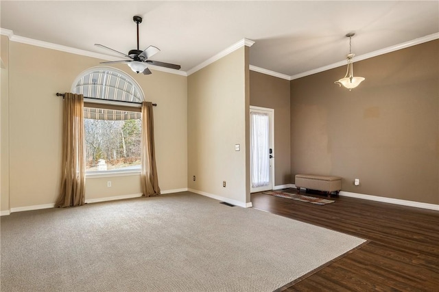 unfurnished living room with wood finished floors, a ceiling fan, baseboards, visible vents, and crown molding