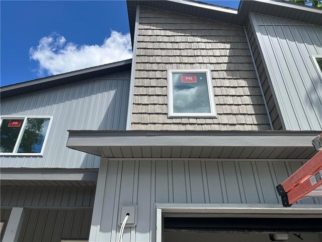 18 Selland Ln, Bella Vista, AR 72715 - view of home's exterior featuring board and batten siding