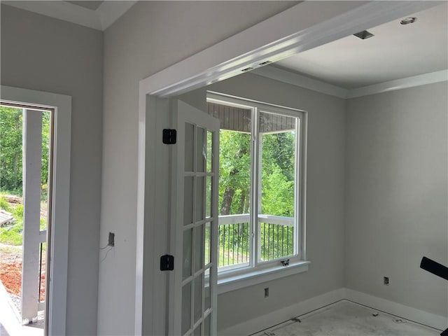18 Selland Ln, Bella Vista, AR 72715 - doorway to outside featuring healthy amount of natural light and baseboards