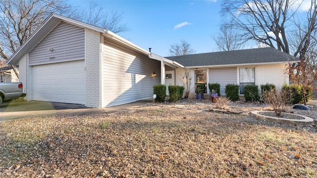 ranch-style home with a garage