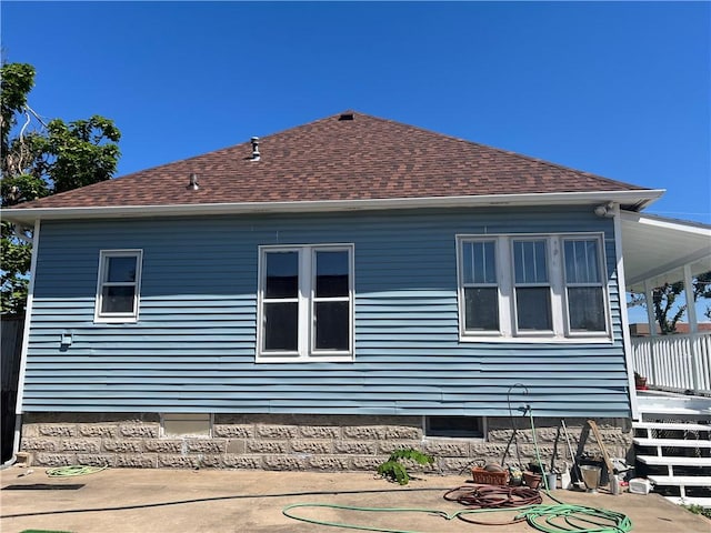 back of house with a patio