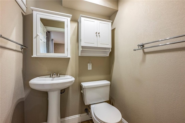 8116 Pine Ln, Rogers, AR 72756 - bathroom with toilet and a sink