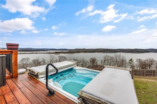 8116 Pine Ln, Rogers, AR 72756 - view of swimming pool featuring a covered hot tub and a deck with water view