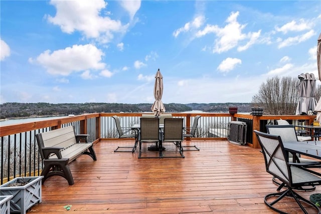 8116 Pine Ln, Rogers, AR 72756 - wooden deck with outdoor dining space