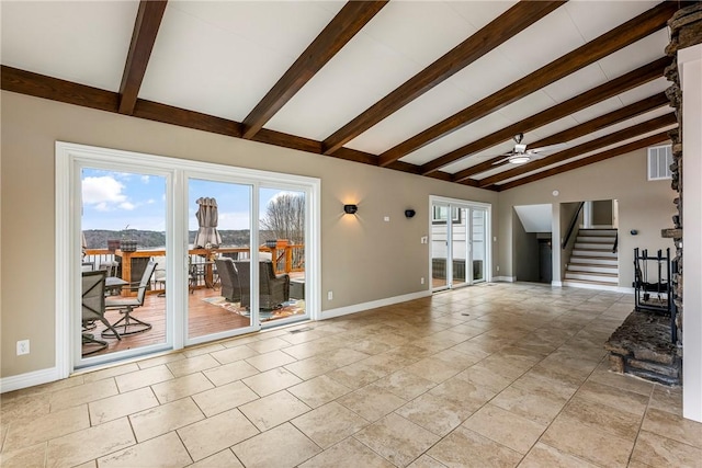 unfurnished living room with lofted ceiling with beams and ceiling fan