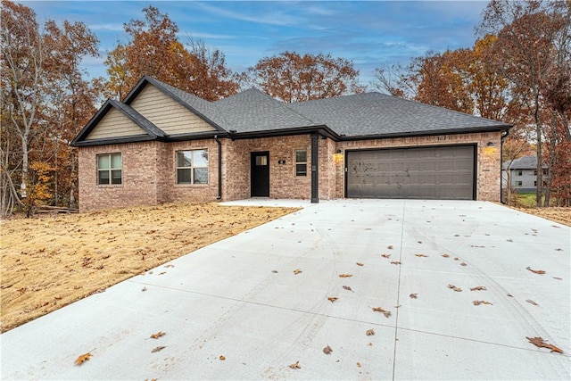 view of front of property with a garage