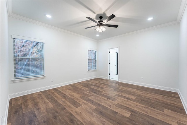 spare room featuring crown molding, ceiling fan, and dark hardwood / wood-style flooring