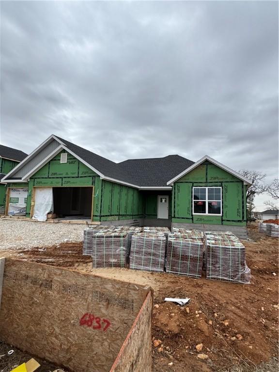 property under construction featuring a garage