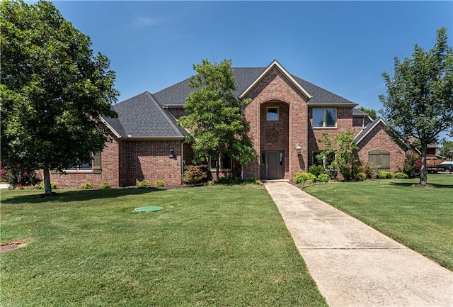 front facade with a front lawn