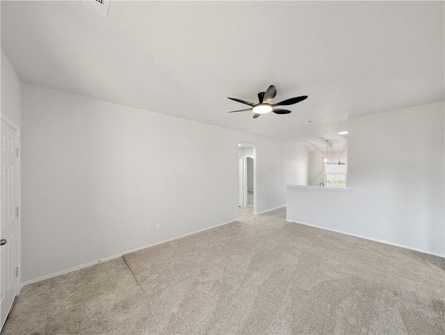 empty room with light carpet and ceiling fan