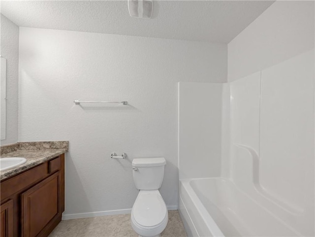 full bathroom with vanity, toilet, and  shower combination