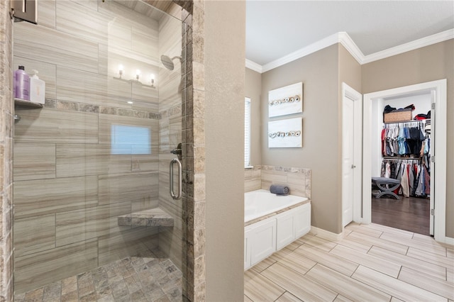 bathroom featuring crown molding and plus walk in shower