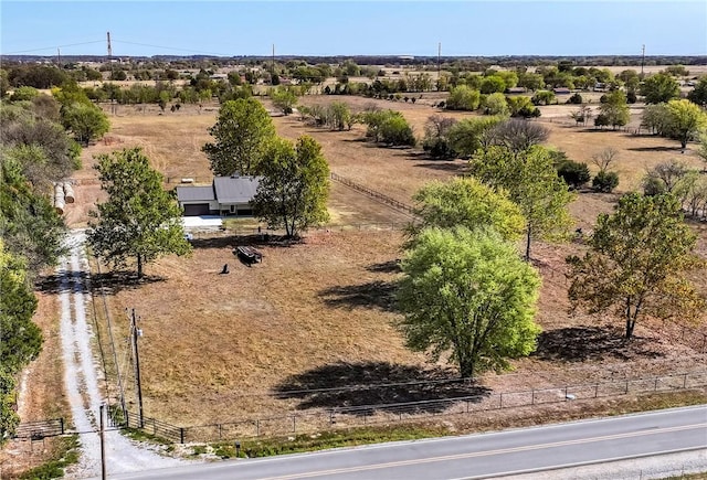 birds eye view of property featuring a rural view