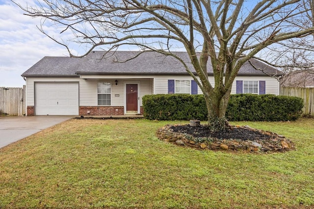 ranch-style house with a garage and a front lawn